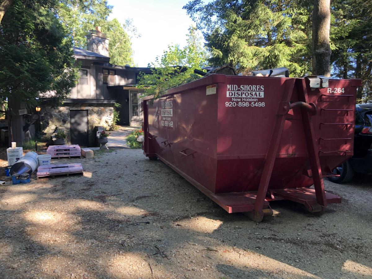 huge_dumpster_blocking_driveway